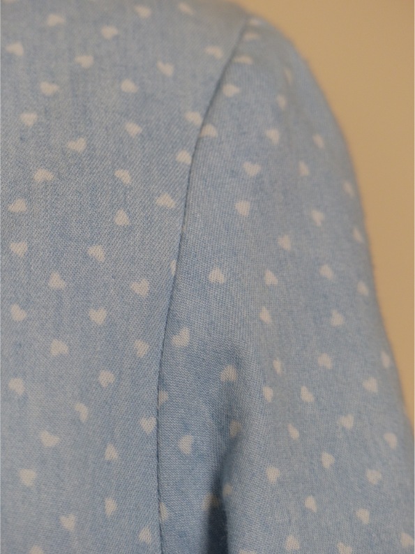 Close up of fabric & shoulder